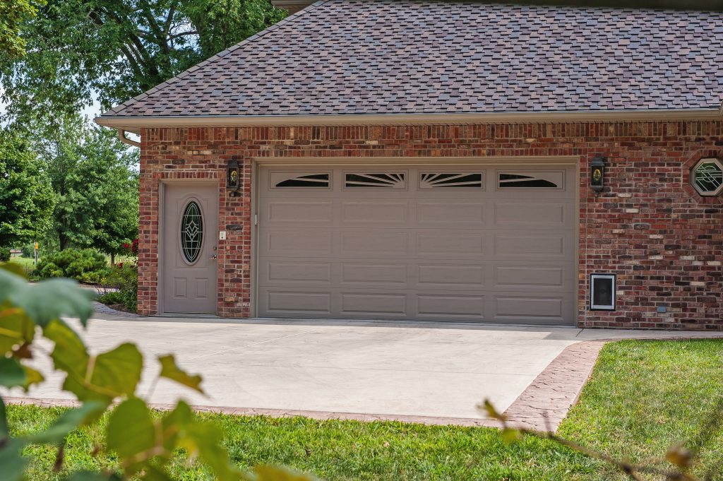 Garage door with classic raised panel design