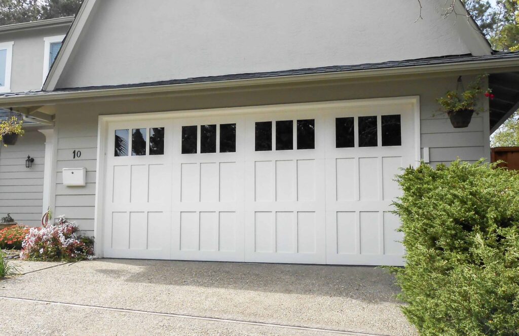 Exterior view of a suburban home with attached garage door