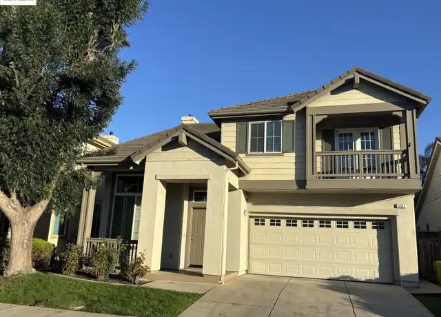 Suburban house in Antioch, California with visible garage door and driveway.