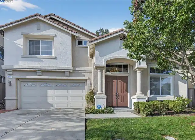 esidential home in Richmond, CA with visible garage door and driveway