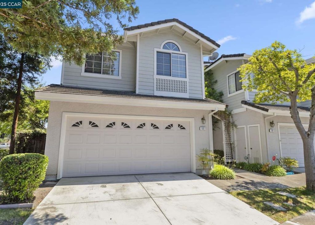 Residential house exterior with garage door.