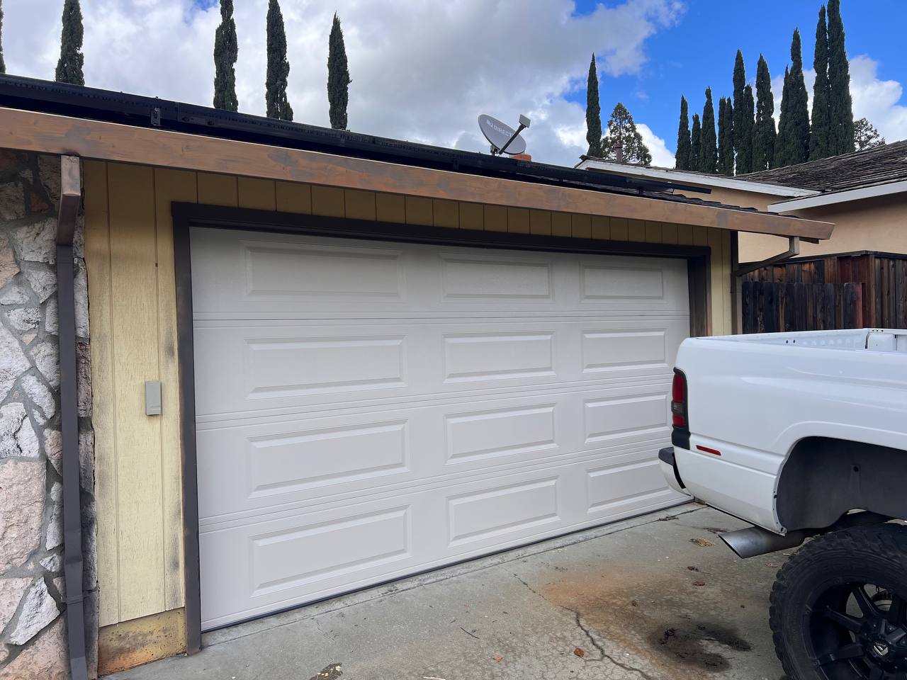 14x7 almond colored garage door from C.H.I. Raised panel model, long panel design, installed in Concord California